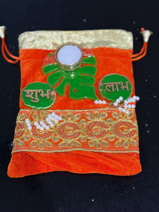 Indian favors, Desi favors, return gifts for all occasions, velvet embroidered potlis with resin candle holder and shubh labh set